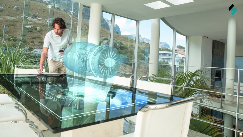 Man in glass room with cup and newspaper with nature and rock formation outdoors